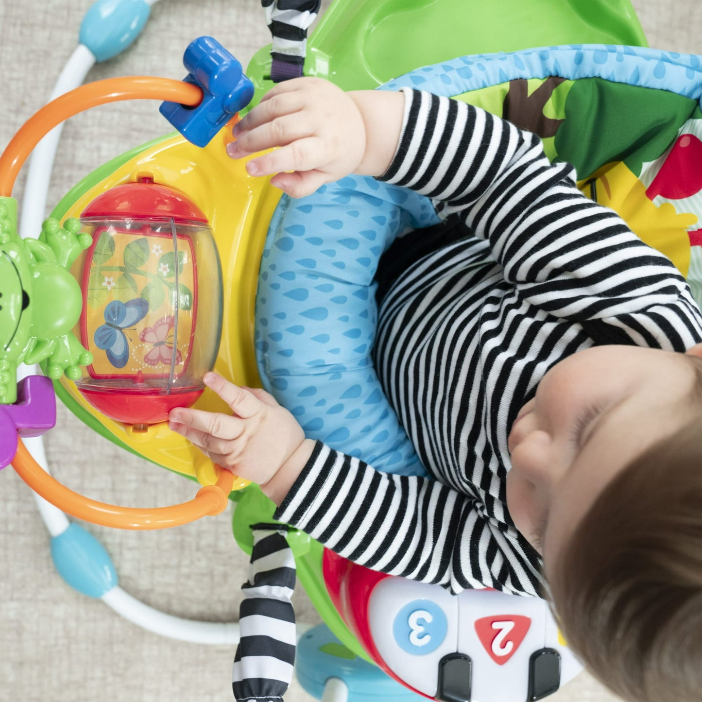 Baby activity jumper – engaging play item designed to encourage movement, exploration, and sensory development for little ones