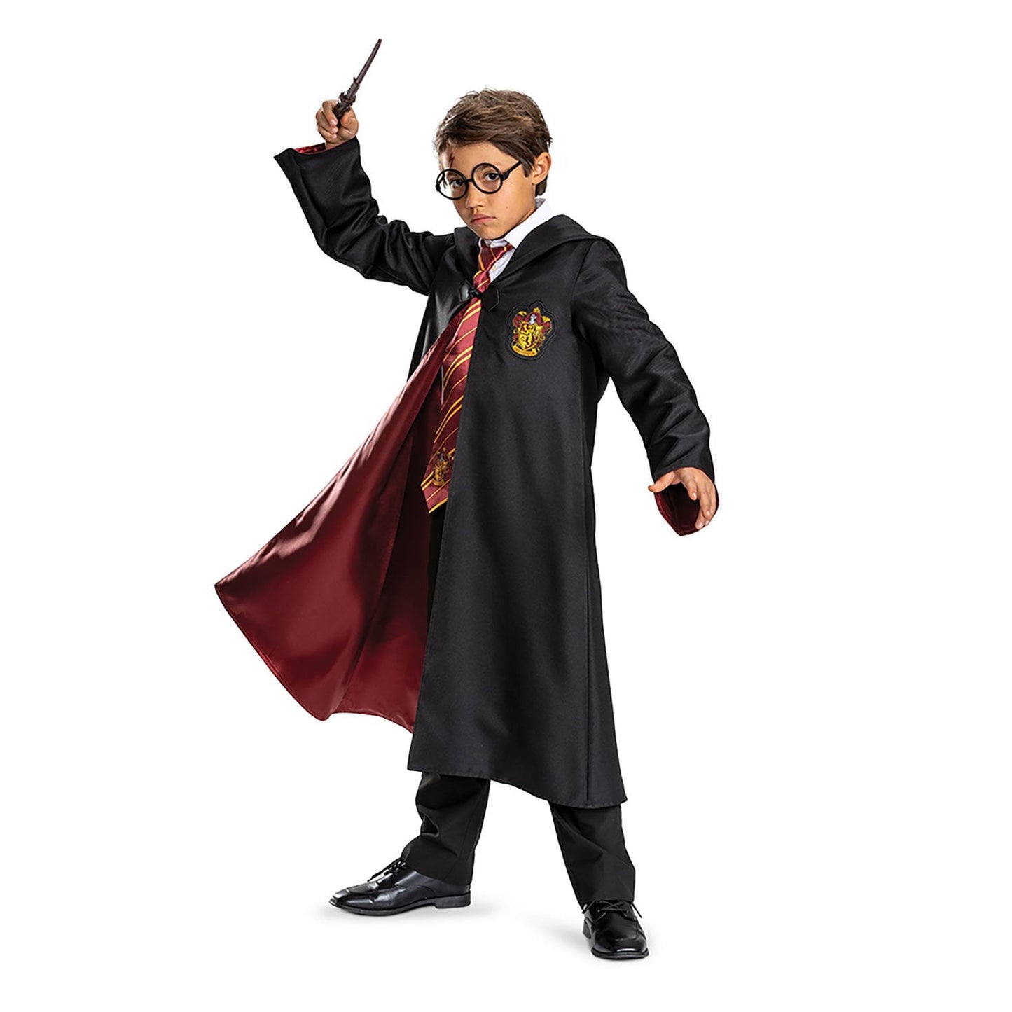 Child in a Harry Potter Halloween costume with a robe and wand on a white background