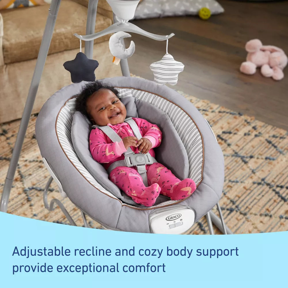 Image displaying a baby in a baby bouncer and swing with text below