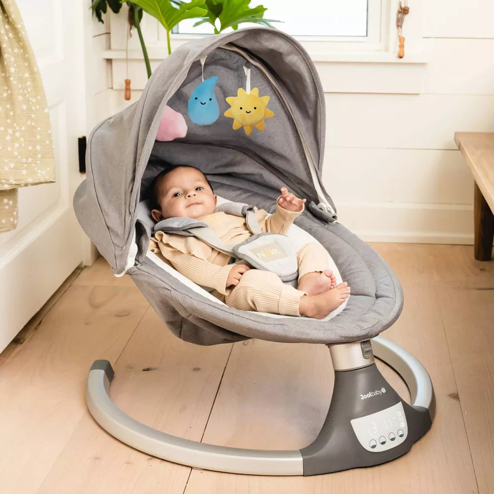 Image displaying a baby in a baby bouncer swing