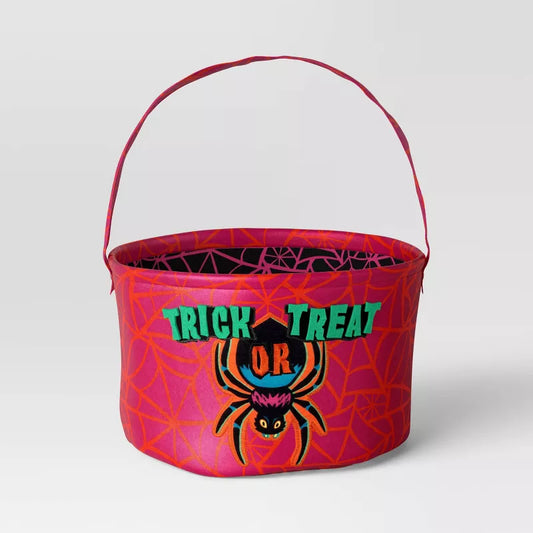Halloween-themed candy bucket with spider design and 'Trick or Treat' text on a white background