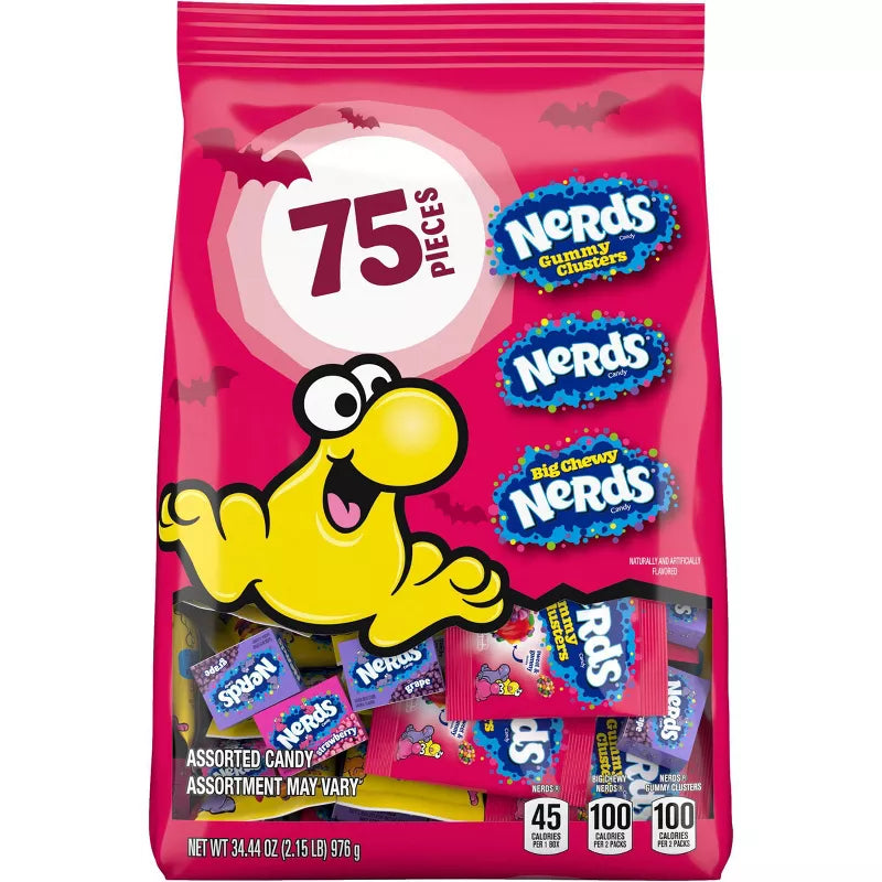 Halloween Themed candy, Pink package of assorted candy with a cartoon character on a white background