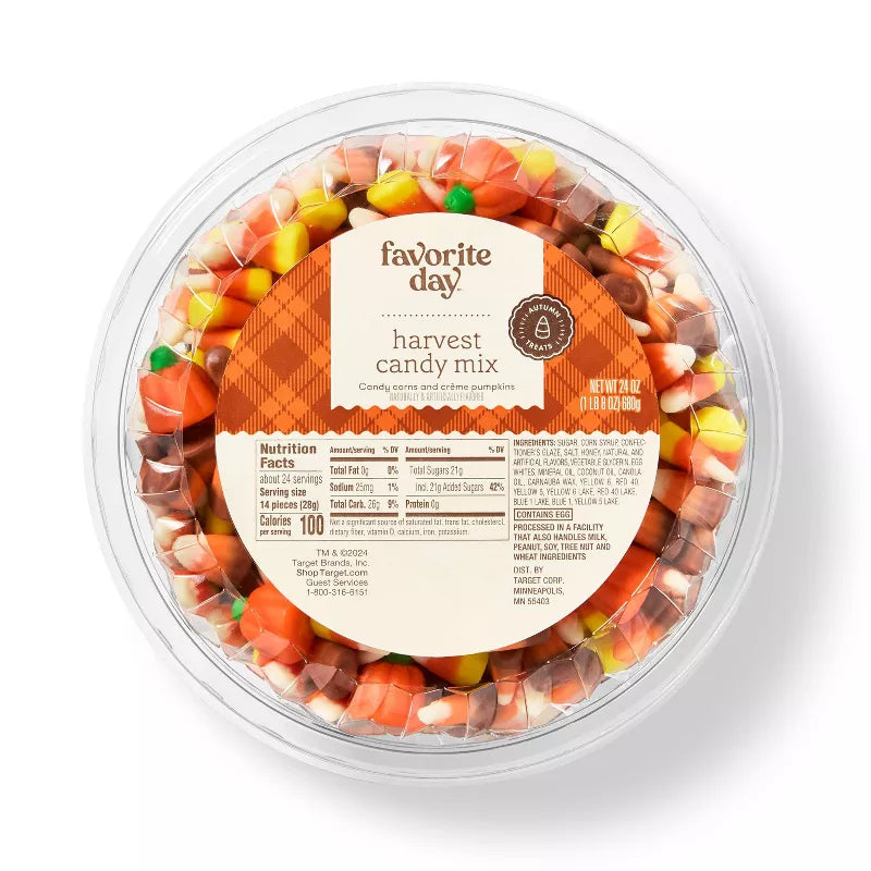Halloween candy, Harvest candy mix in a clear container on a white background