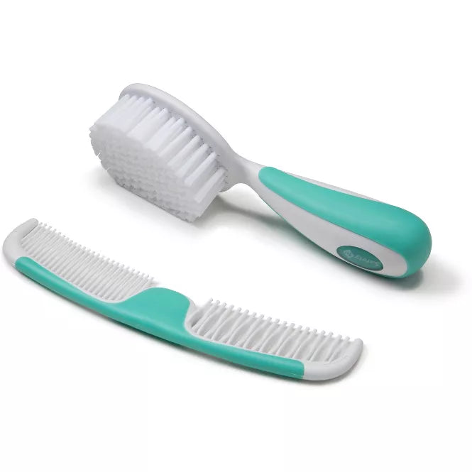 Teal and white pet grooming brush and comb set on a white background