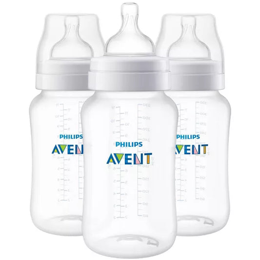Three baby bottles on a white background