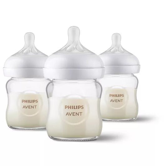 Three baby bottles on a white background