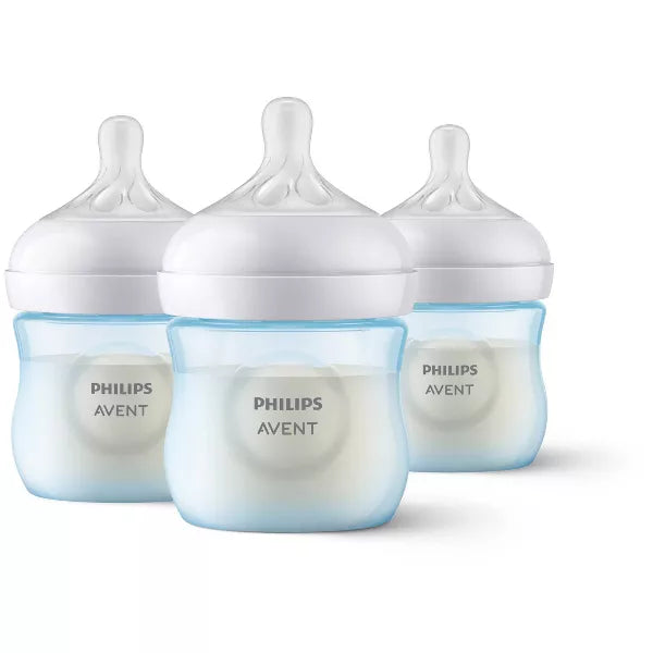 Three baby bottles on a white background