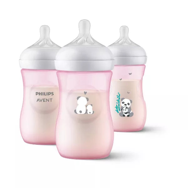 Three pink baby bottles with panda designs on a white background
