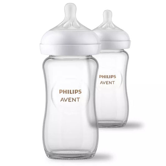 Two baby bottles on a white background