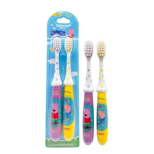 Two children's toothbrushes with Peppa Pig design in a blue package on a white background