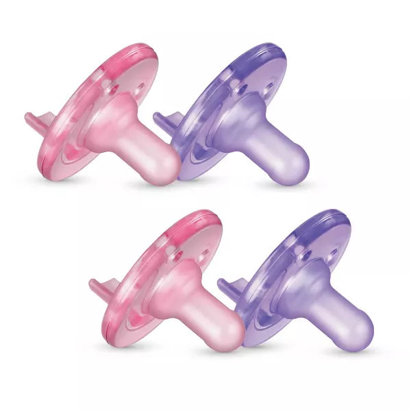 Two pink and purple baby pacifiers on a white background