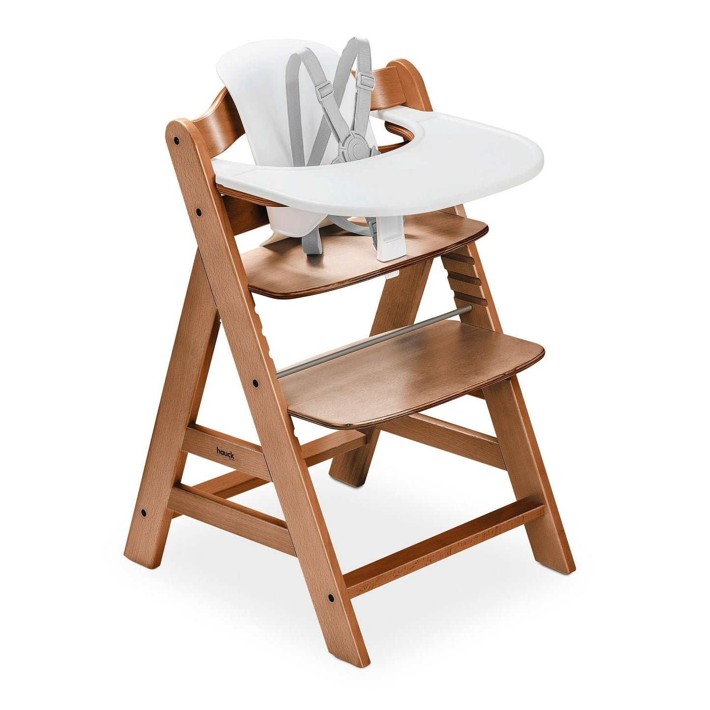 Wooden high chair with white tray and harness on a white background