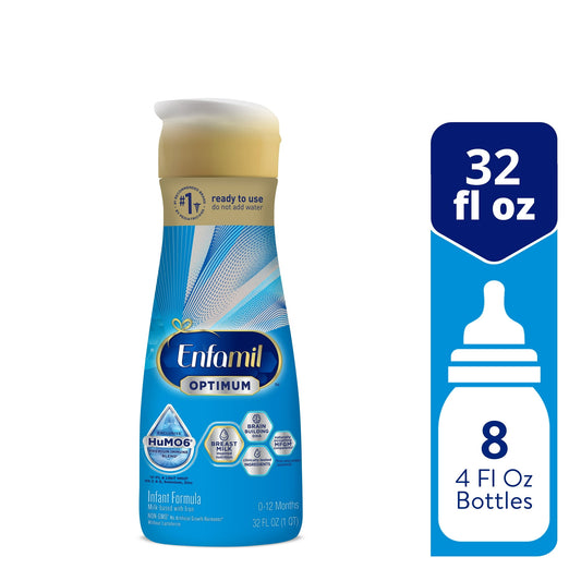 baby formula bottle with packaging on a white background