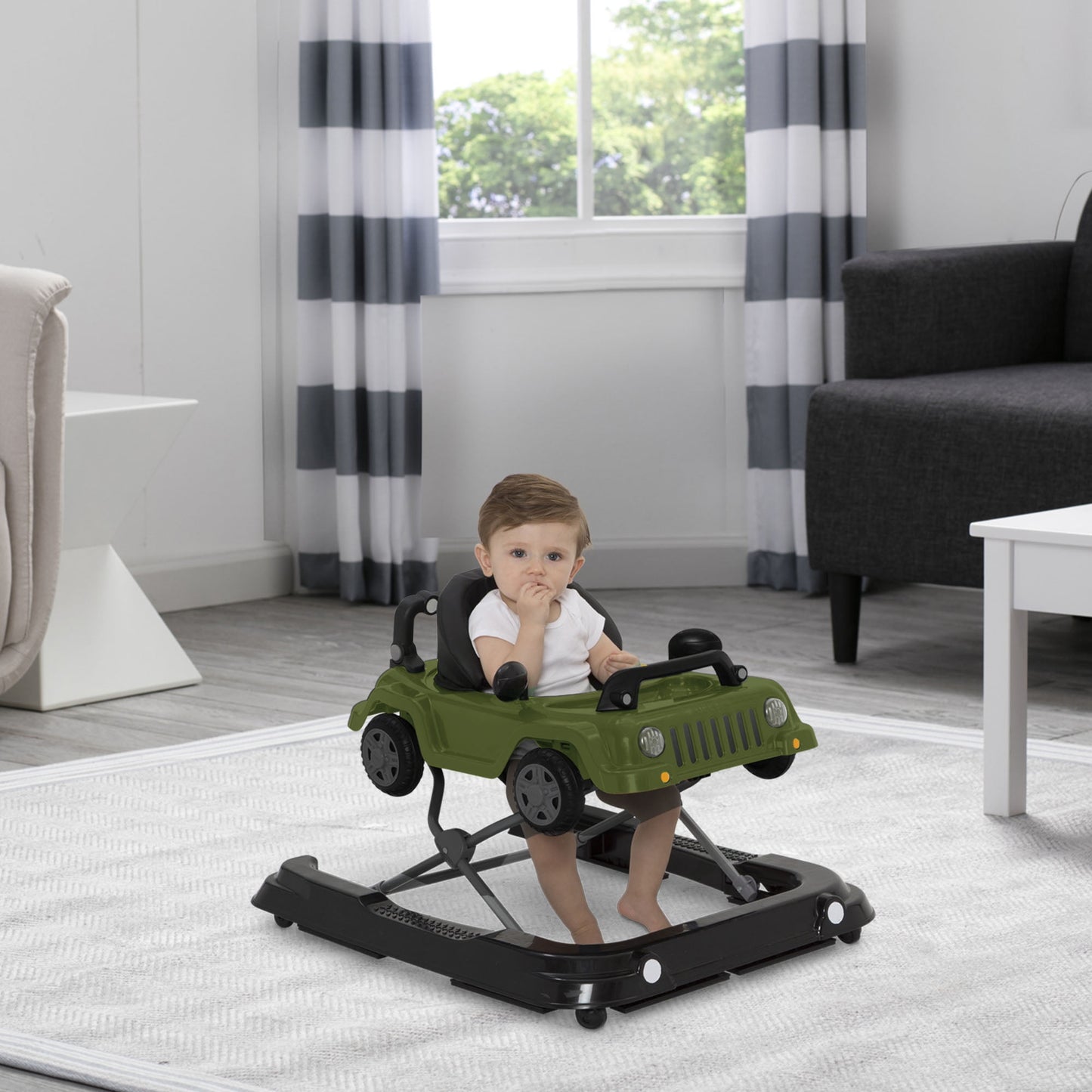 Image displaying a baby playing with a baby activity walker