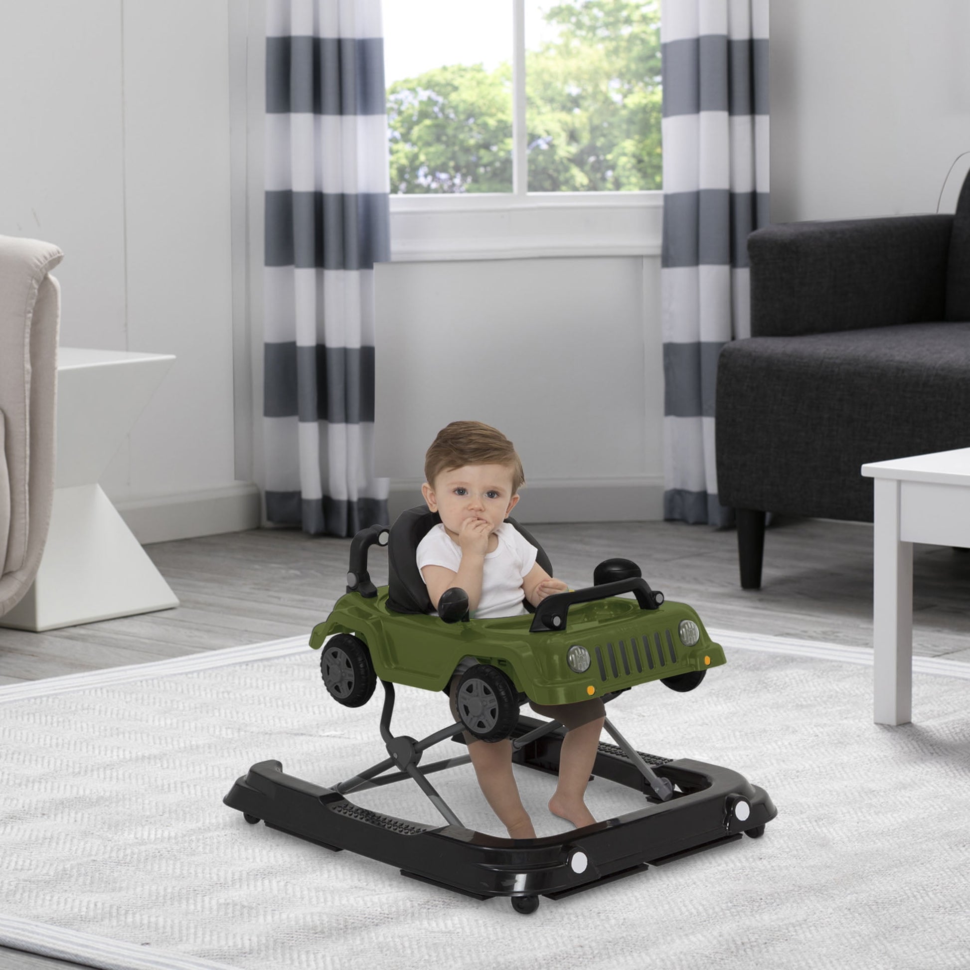 Image displaying a baby playing with a baby activity walker