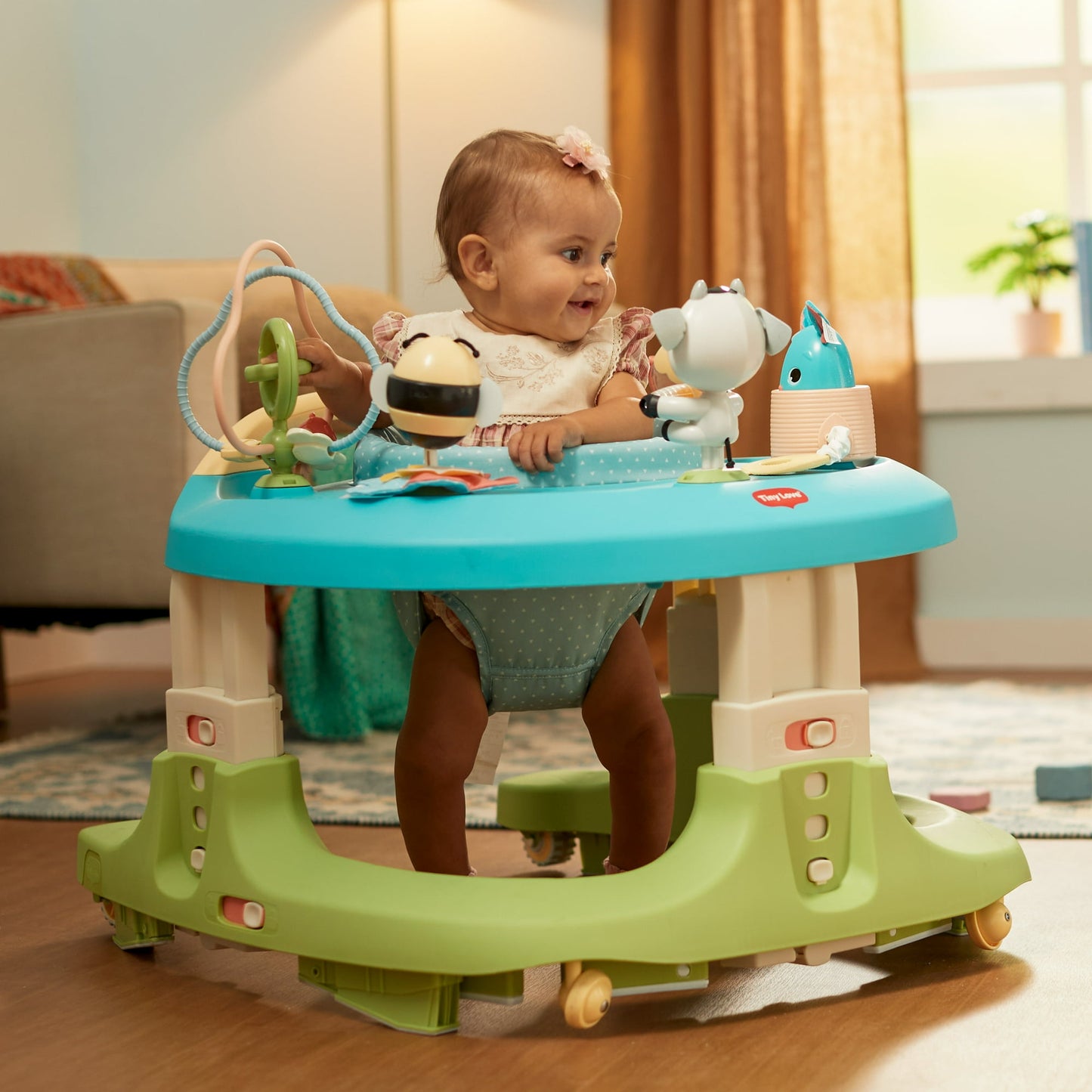Image displaying a baby in a baby activity walker