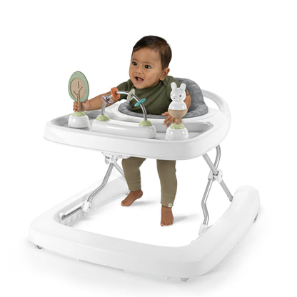 Image displaying a baby playing with a baby activity walker