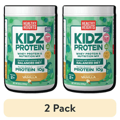 Canisters of protein shake mix powder for kids, primarily green and white, on a plain background