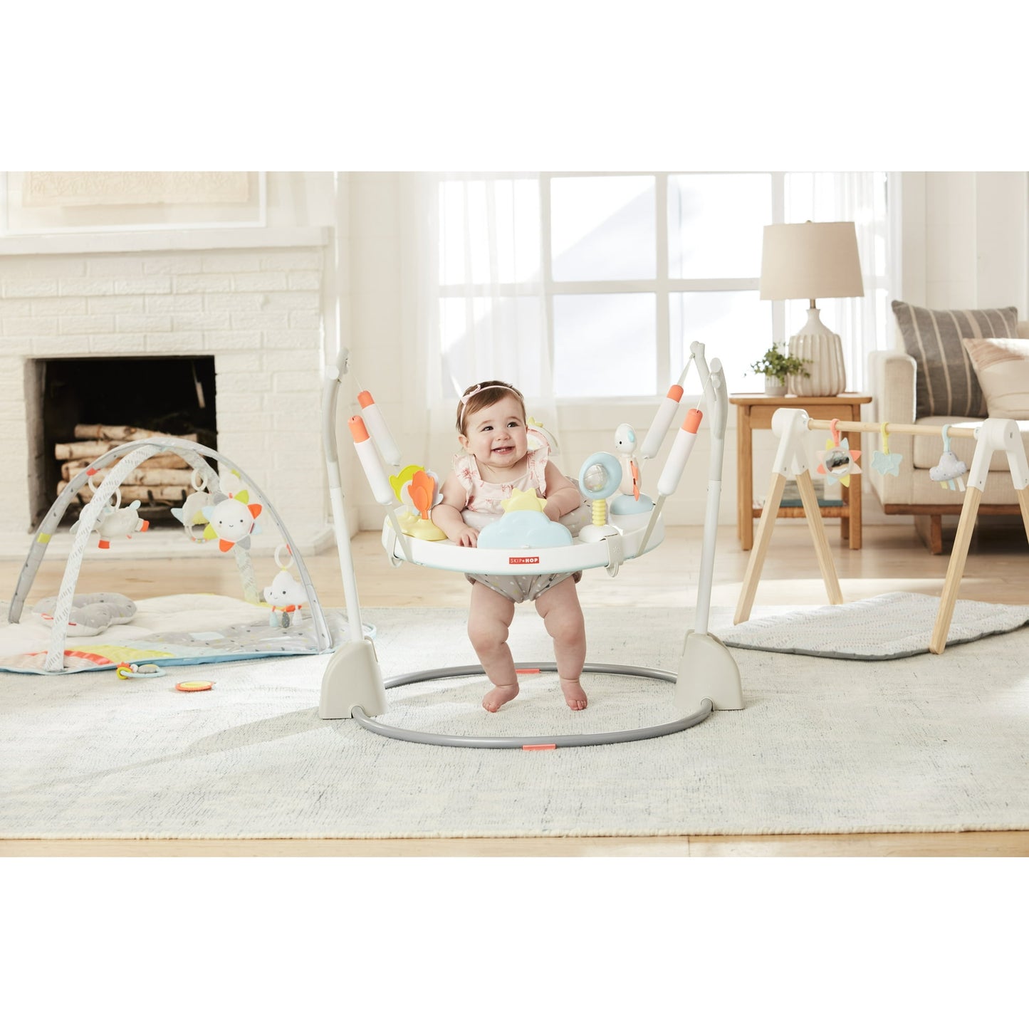 Image displaying a baby in a baby activity jumper