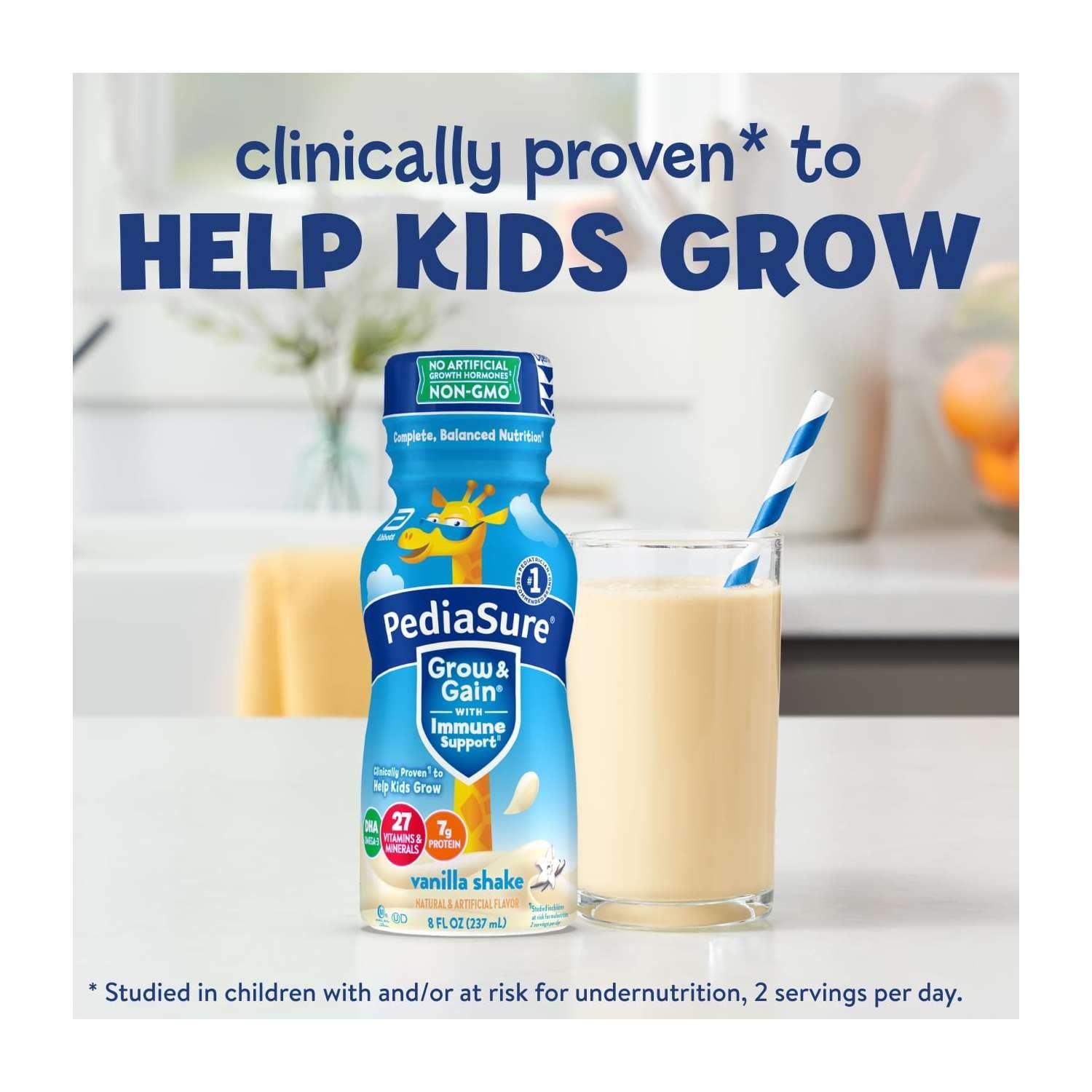 Children's vanilla protein shake bottle and a glass of the shake with a straw on a light background