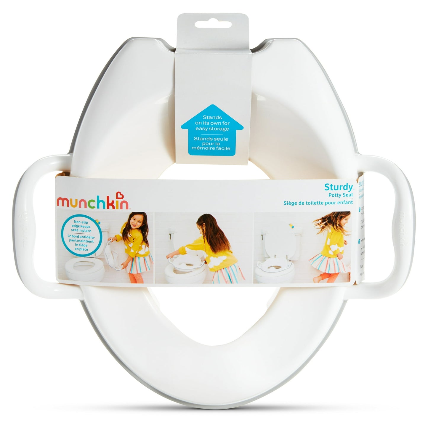 A white child's toilet training seat with handles, shown packaged