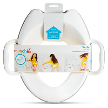 A white child's toilet training seat with handles, shown packaged