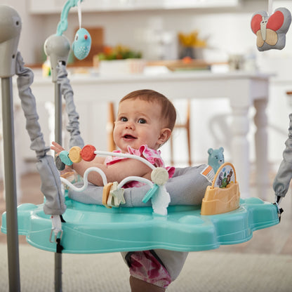 Image displaying a baby in a baby activity jumper