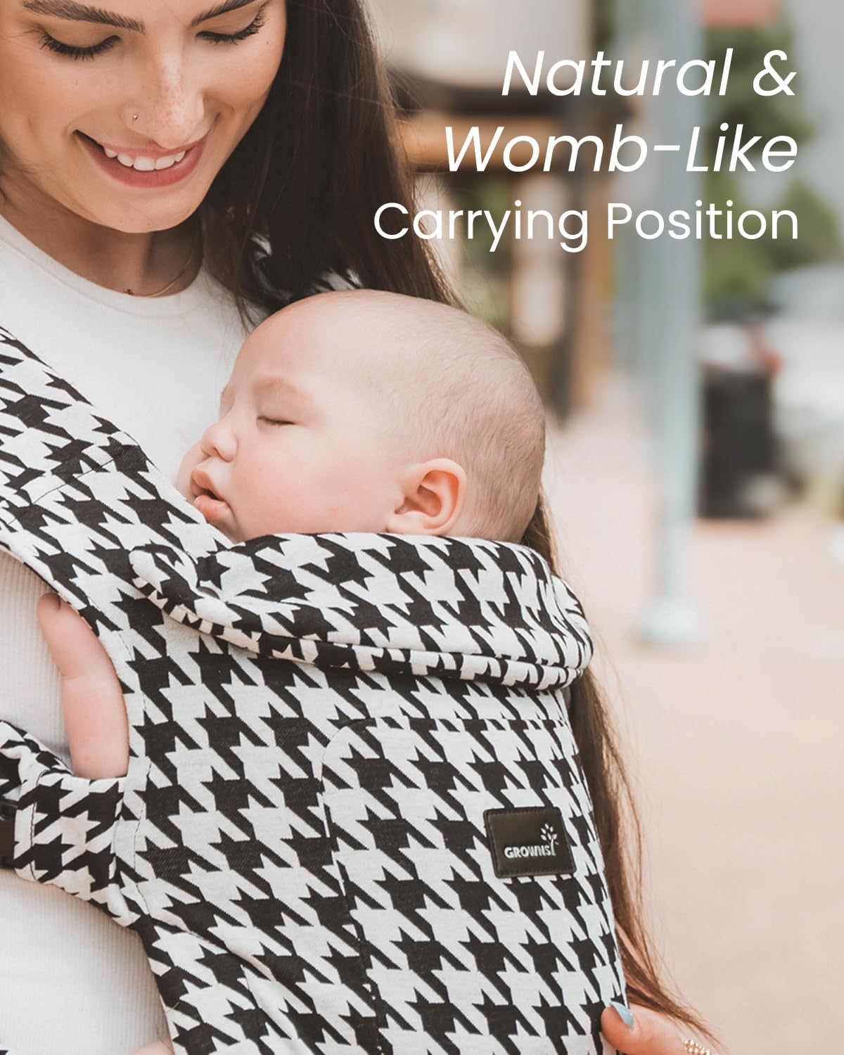 Image displaying a baby in a baby carrier and text about it's deetalis 