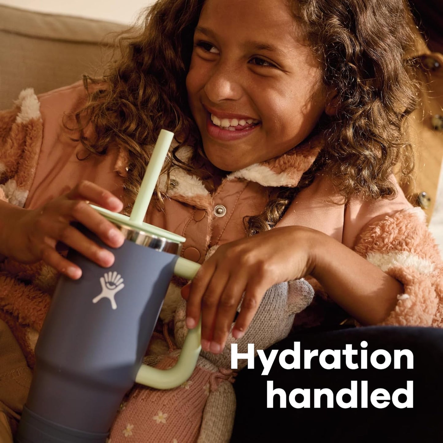 Image displaying a kid holding a tumbler and text about it's details