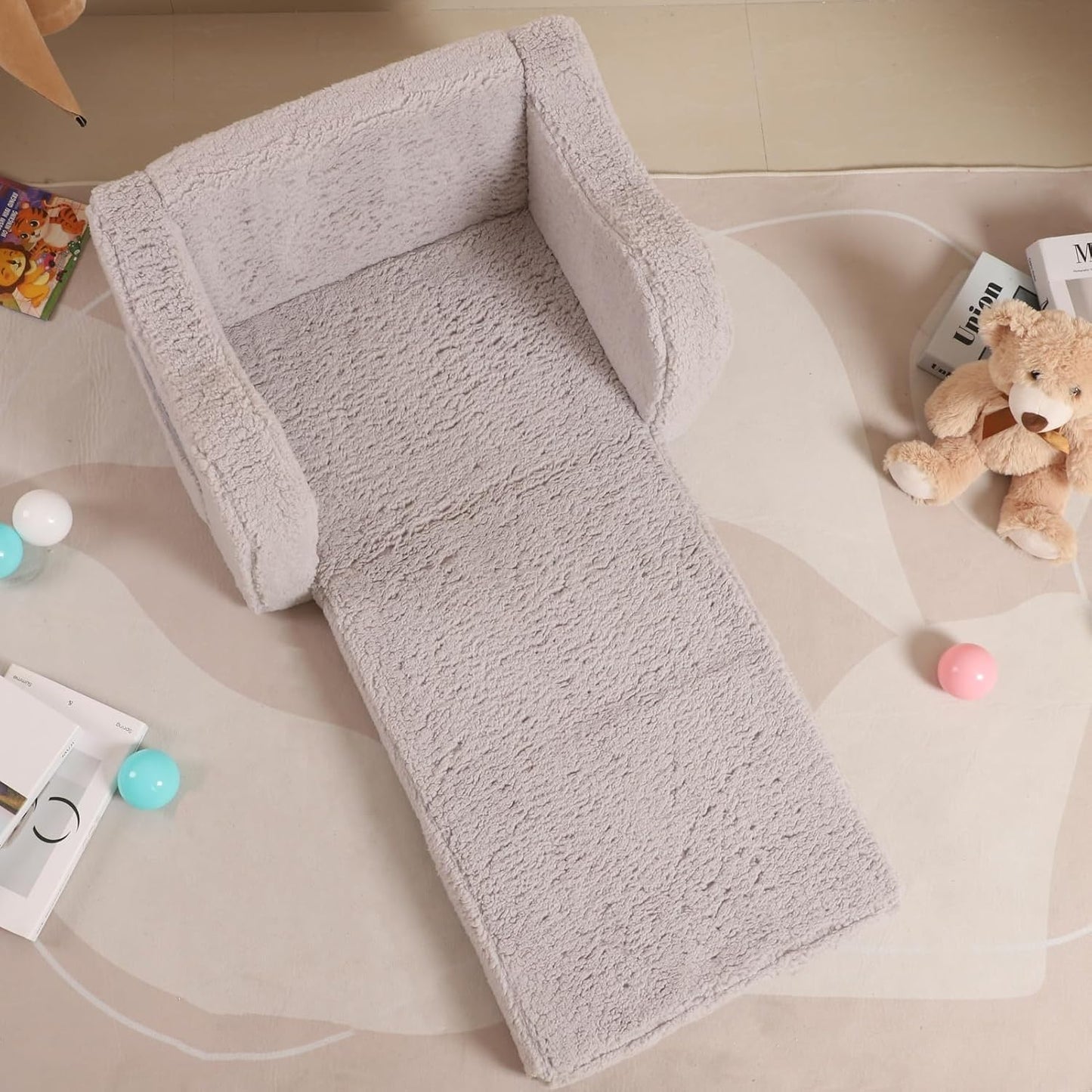 Soft modular play furniture for children, ideal for imaginative play, relaxing, and flexible indoor activities