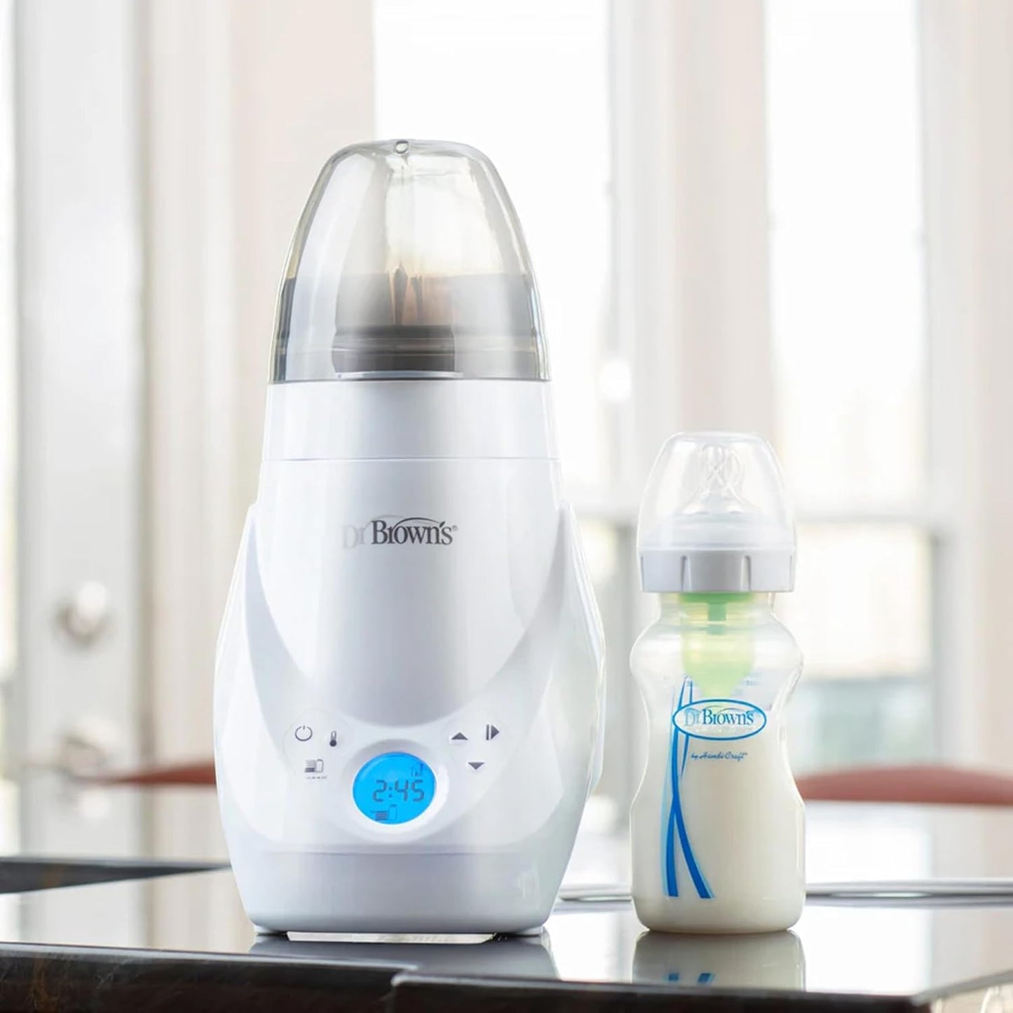 Baby bottle warmer/sterilizer – feeding essential designed to safely warm and sanitize bottles and baby food