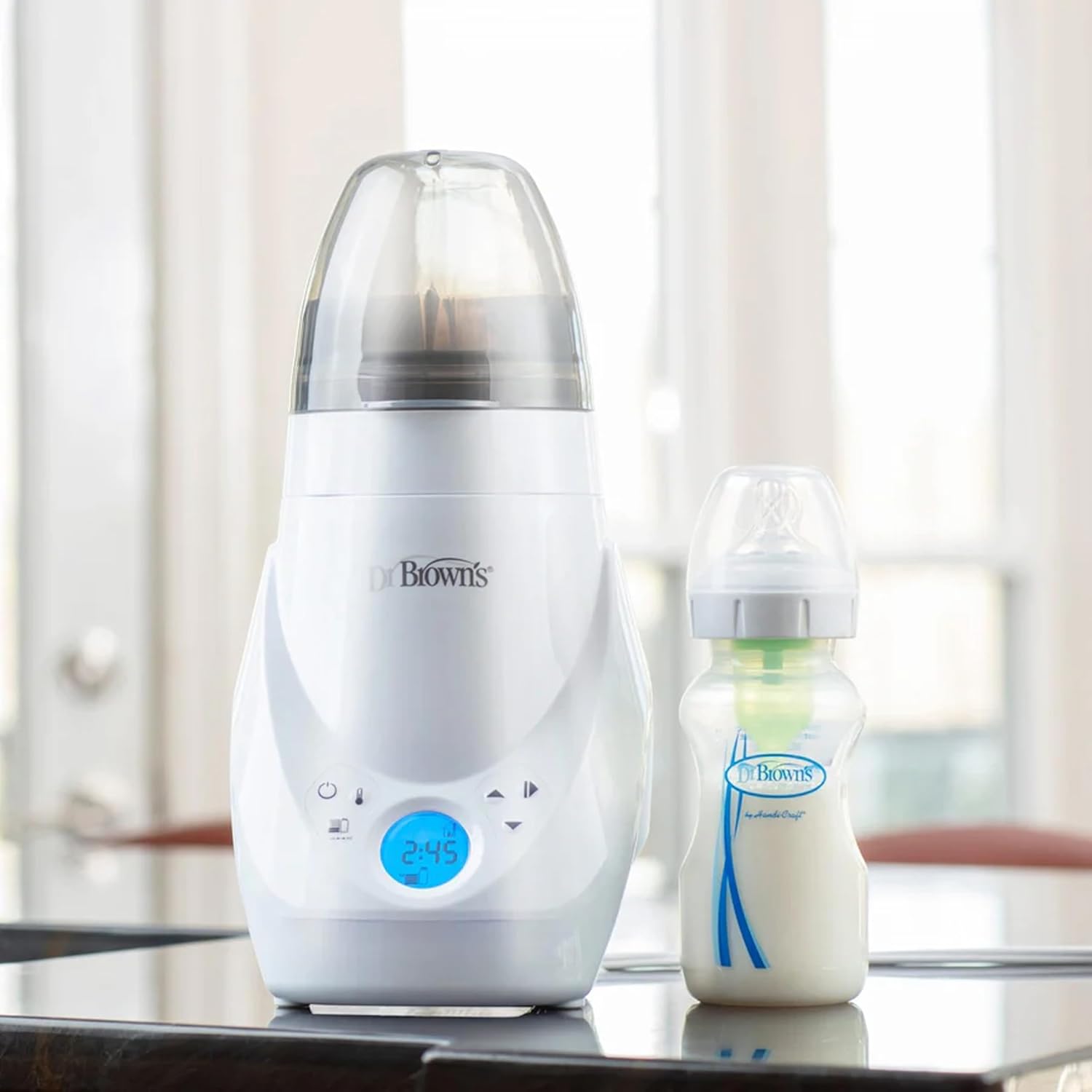 Baby bottle warmer/sterilizer – feeding essential designed to safely warm and sanitize bottles and baby food