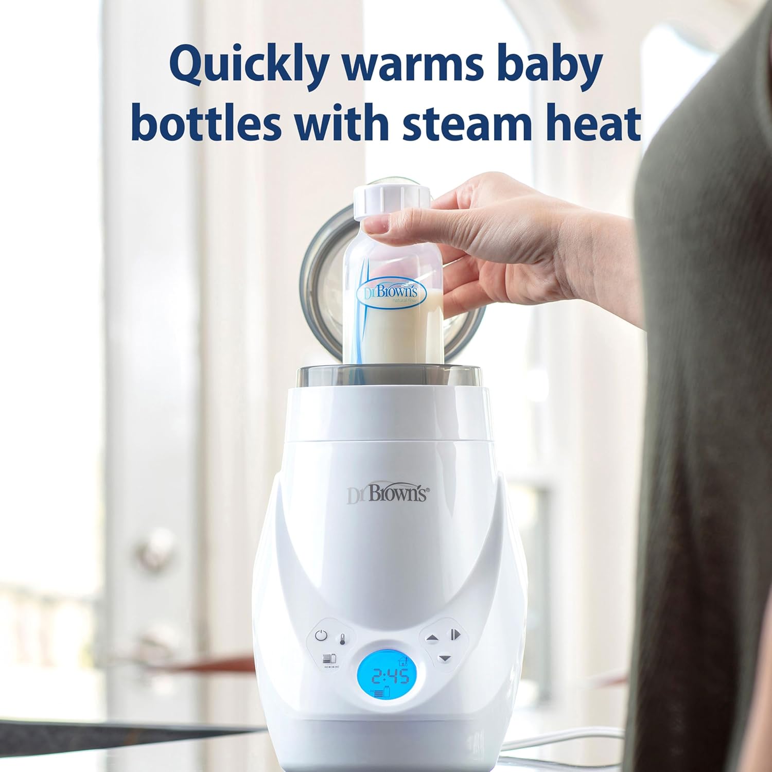 Image displaying a baby bottle warmer/sterilizer and text about it's details