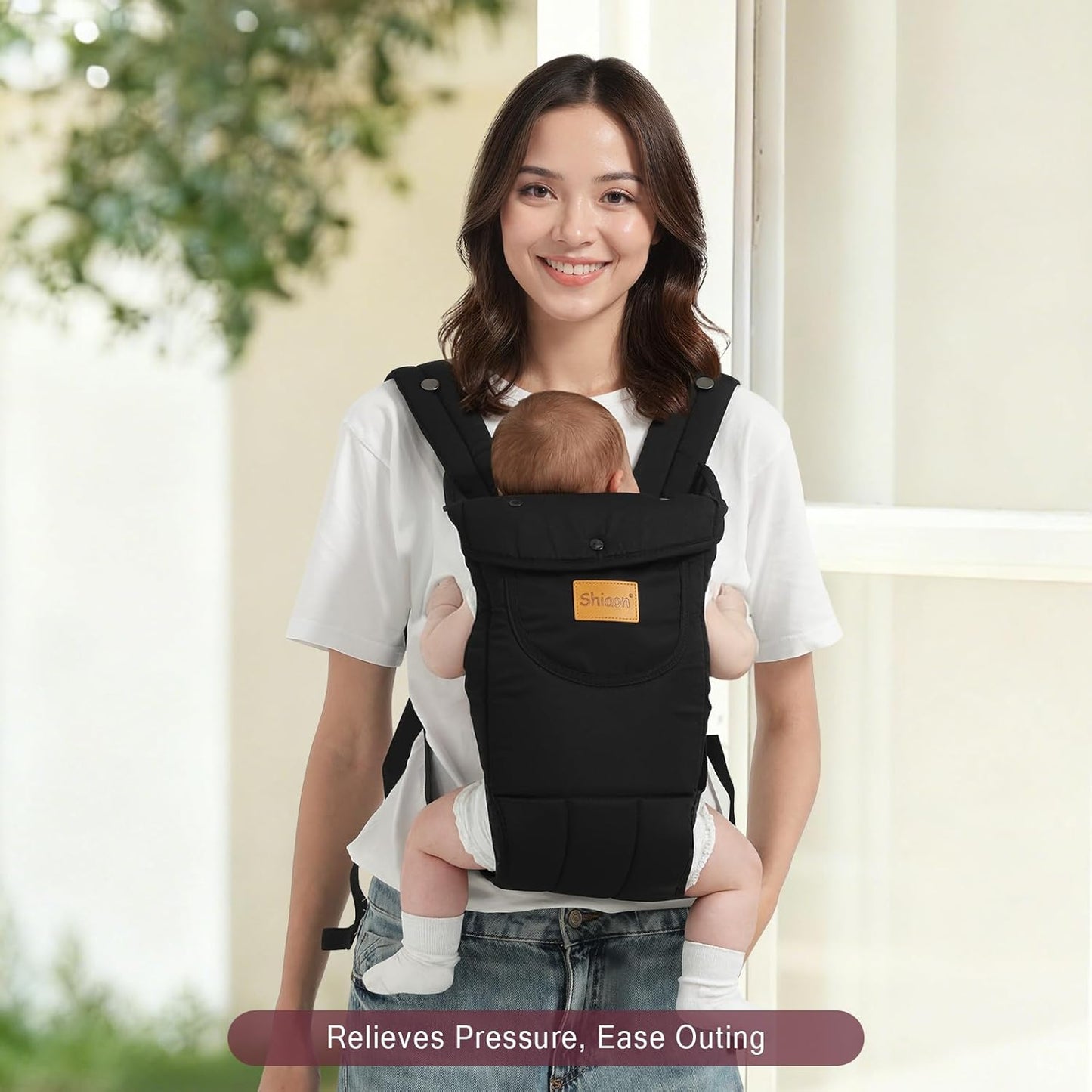Image displaying a baby in a baby carrier and text about it's details
