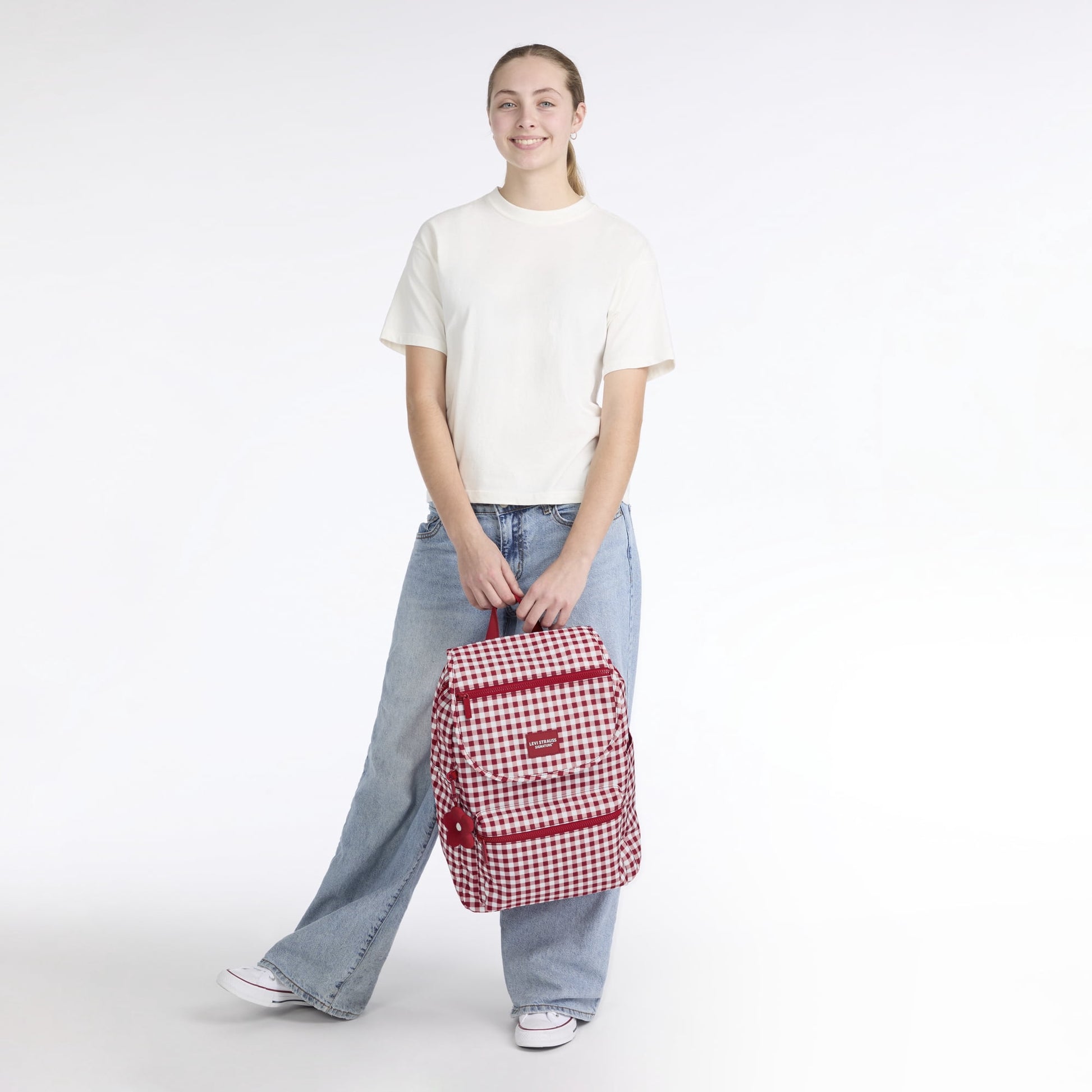Women's top loader backpack featuring a roomy main compartment for laptops, books, and daily essentials.