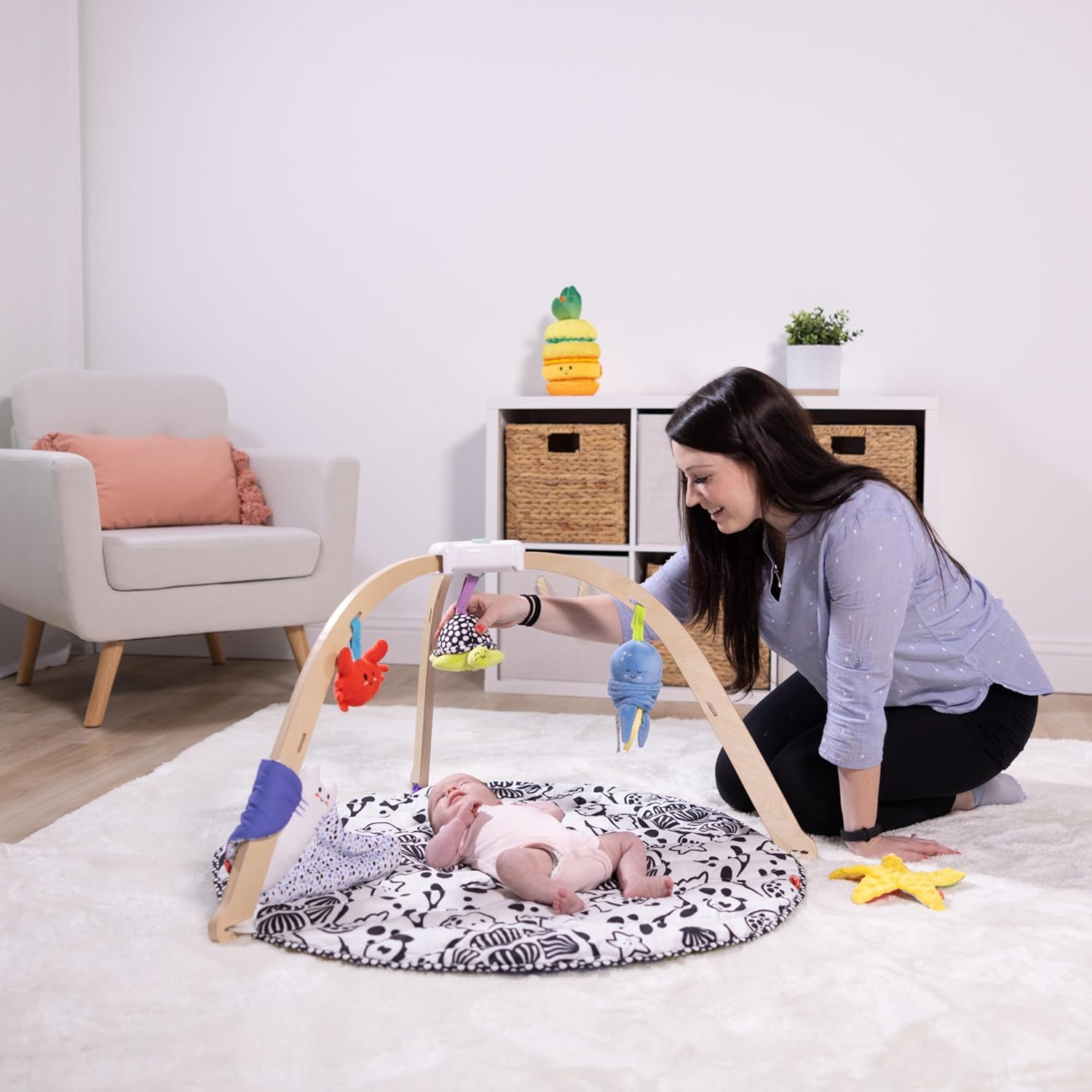Image displaying a baby playinng with a Baby activity play set