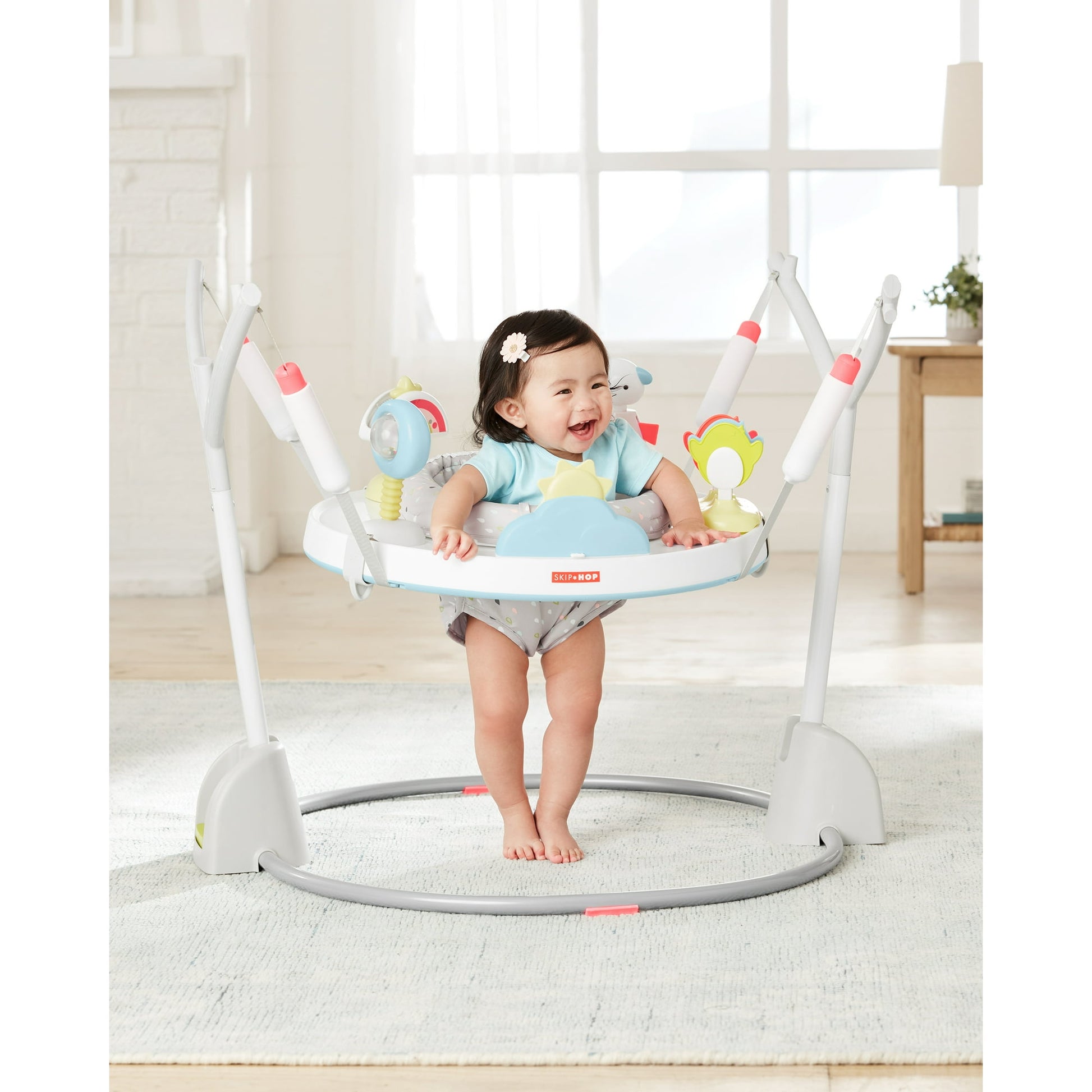 Image displaying a baby in a baby activity jumper