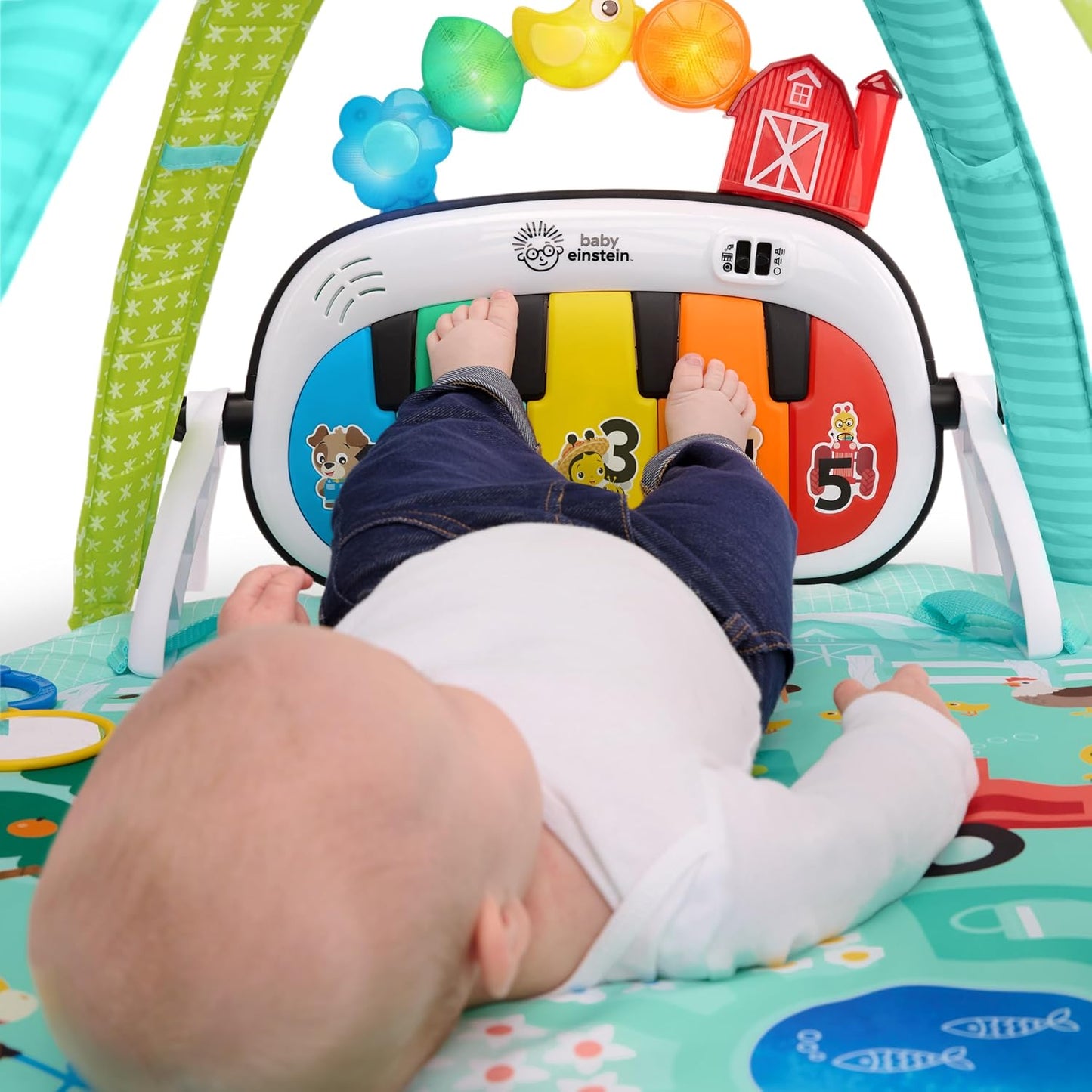 Image displaying a baby playinng with a Baby activity play set