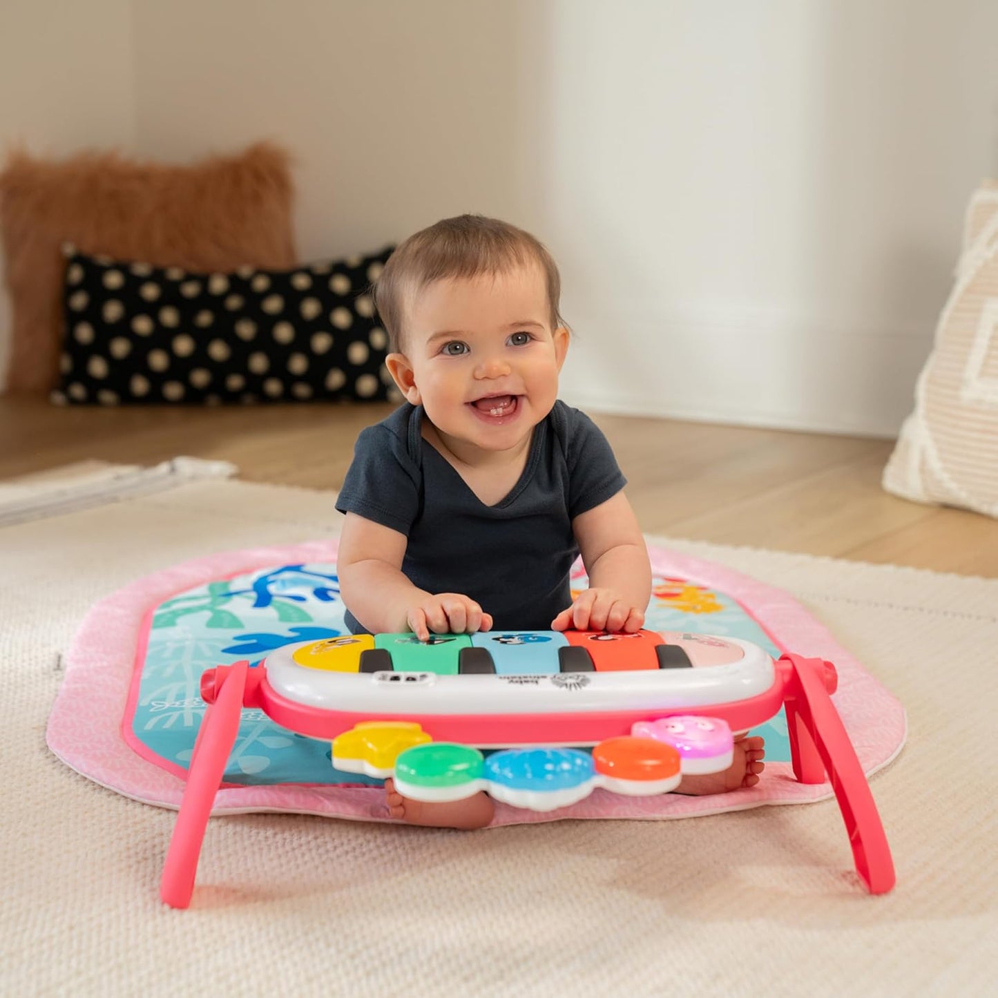 Image displaying a baby playinng with a Baby activity play set