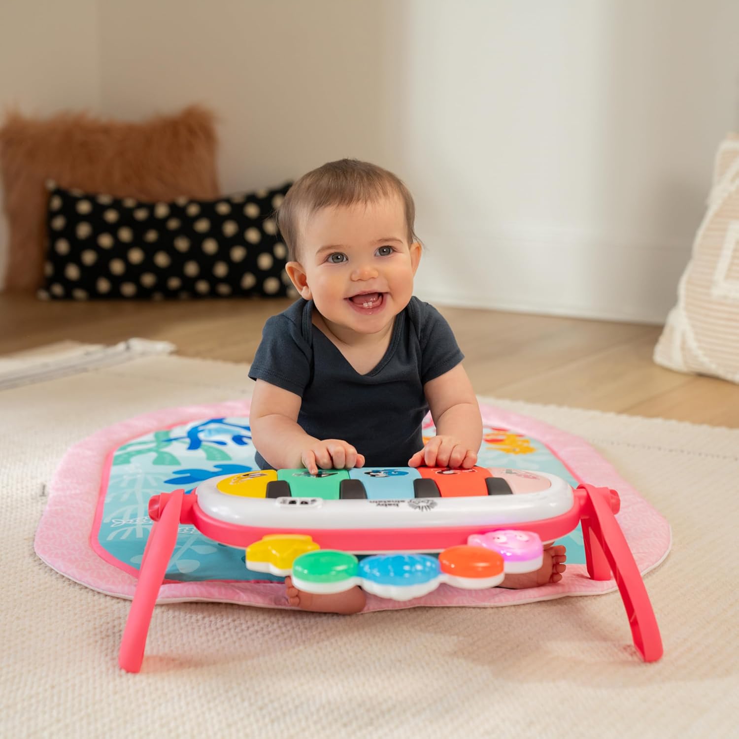 Image displaying a baby playinng with a Baby activity play set