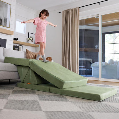 Image displaying a kid playing with a soft modular play furniture