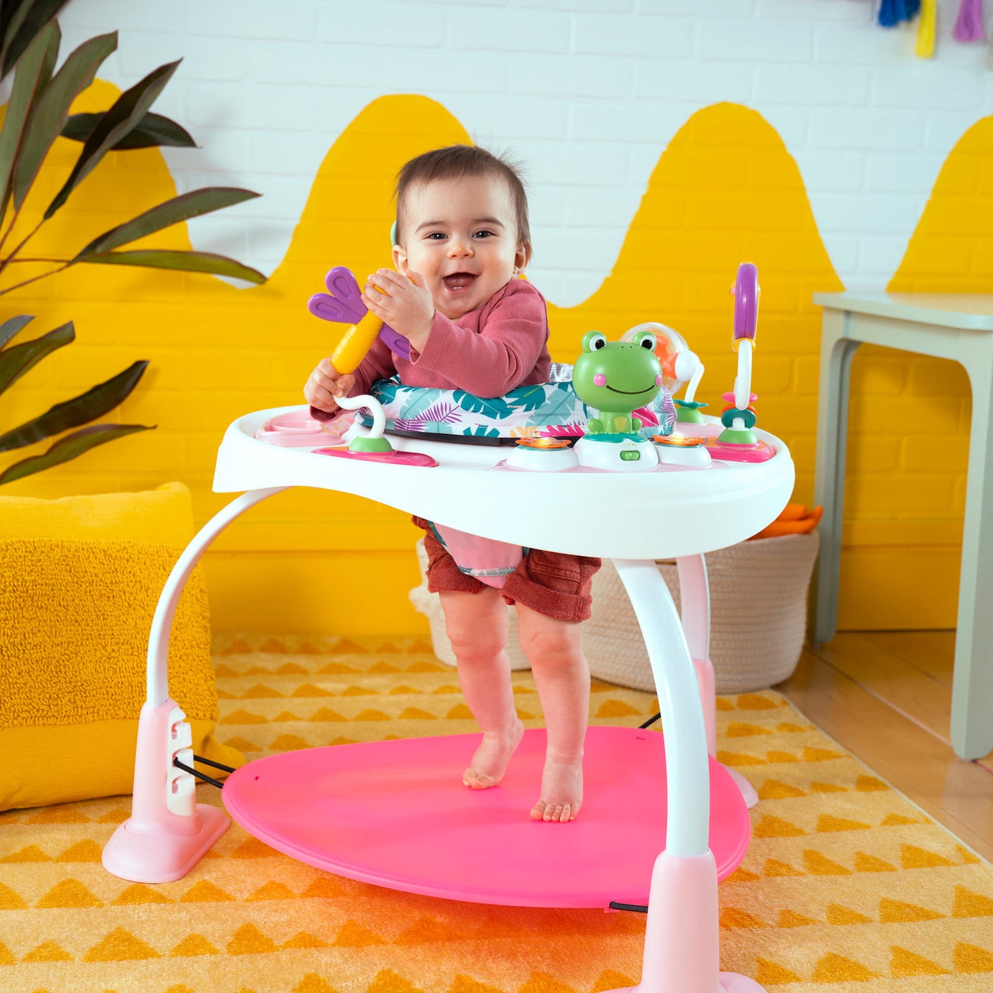 Image displaying a baby in a baby activity jumper