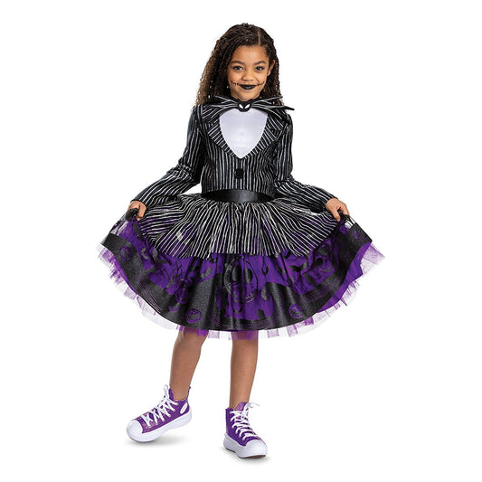 Child wearing a black and purple Halloween costume with a white background