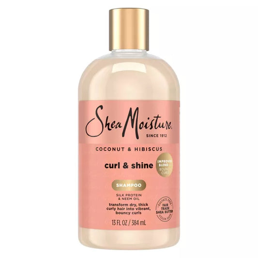 Coconut & Hibiscus Curl & Shine shampoo bottle on a white background