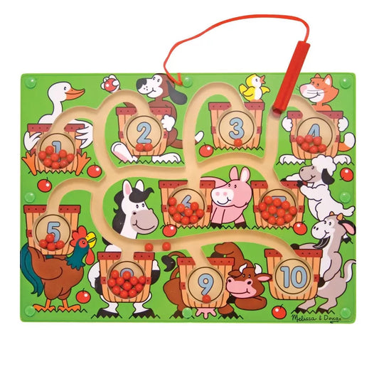 A magnetic maze board with farm animals, numbered baskets, red beads, and an attached magnetic wand