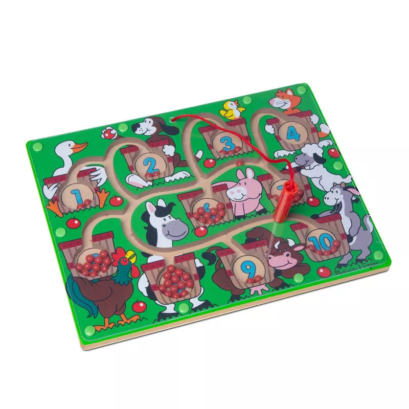 A magnetic maze board featuring farm animals, numbered baskets, and a wand to move red beads