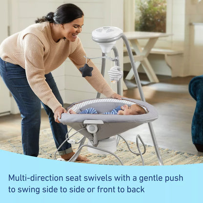 Image displaying a baby in a baby bouncer and swing with text below