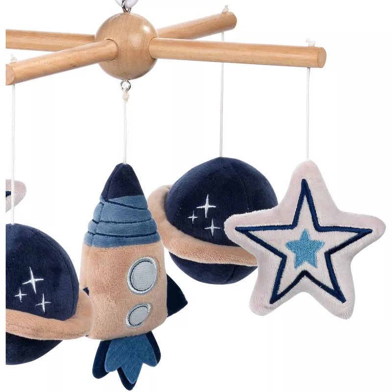 A baby crib mobile featuring hanging plush planets, a rocket ship, and a star