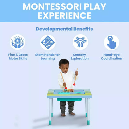 A child playing at a activity table, with blue text headers above displaying the table's features