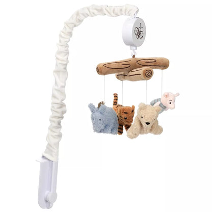 A baby crib mobile with plush Pooh, Piglet, Tigger, and Eeyore figures hanging from a wooden-look branch